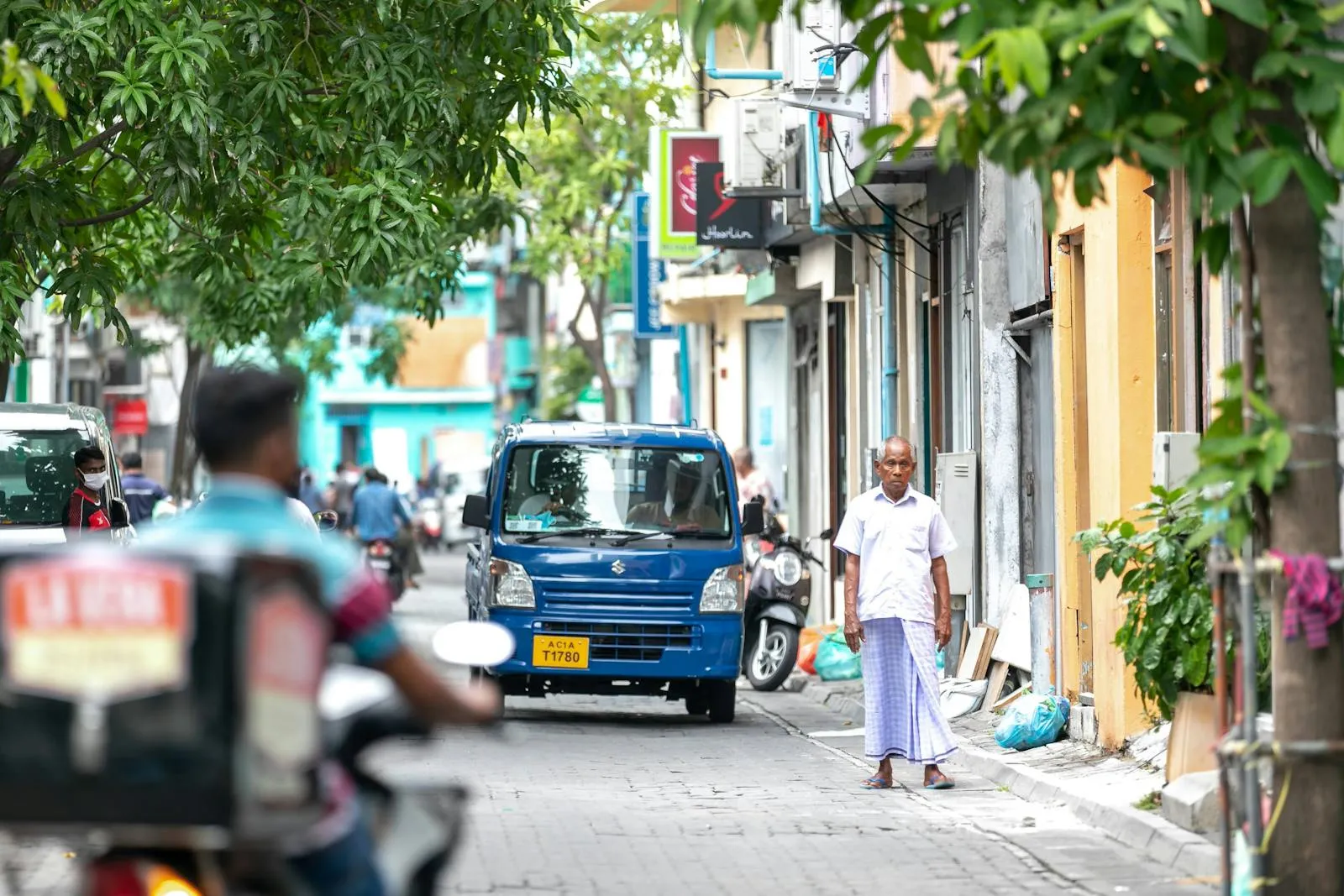 A busy street in Male, Maldives showing local daily life