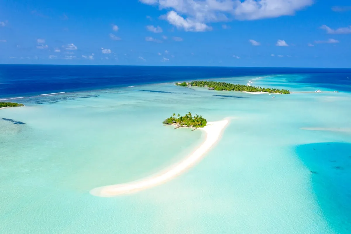 Aerial view of a turquoise lagoon in Baa Atoll, Maldives