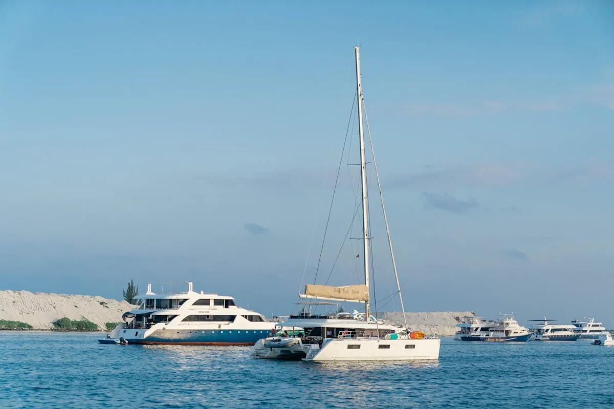 Yachts and boats by the shore of a Maldivian island